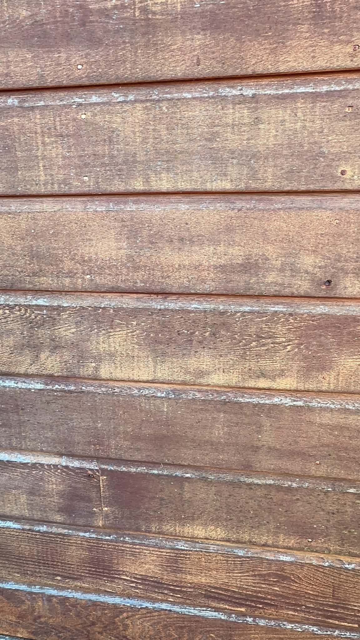Weathered cedar exterior before preparation.