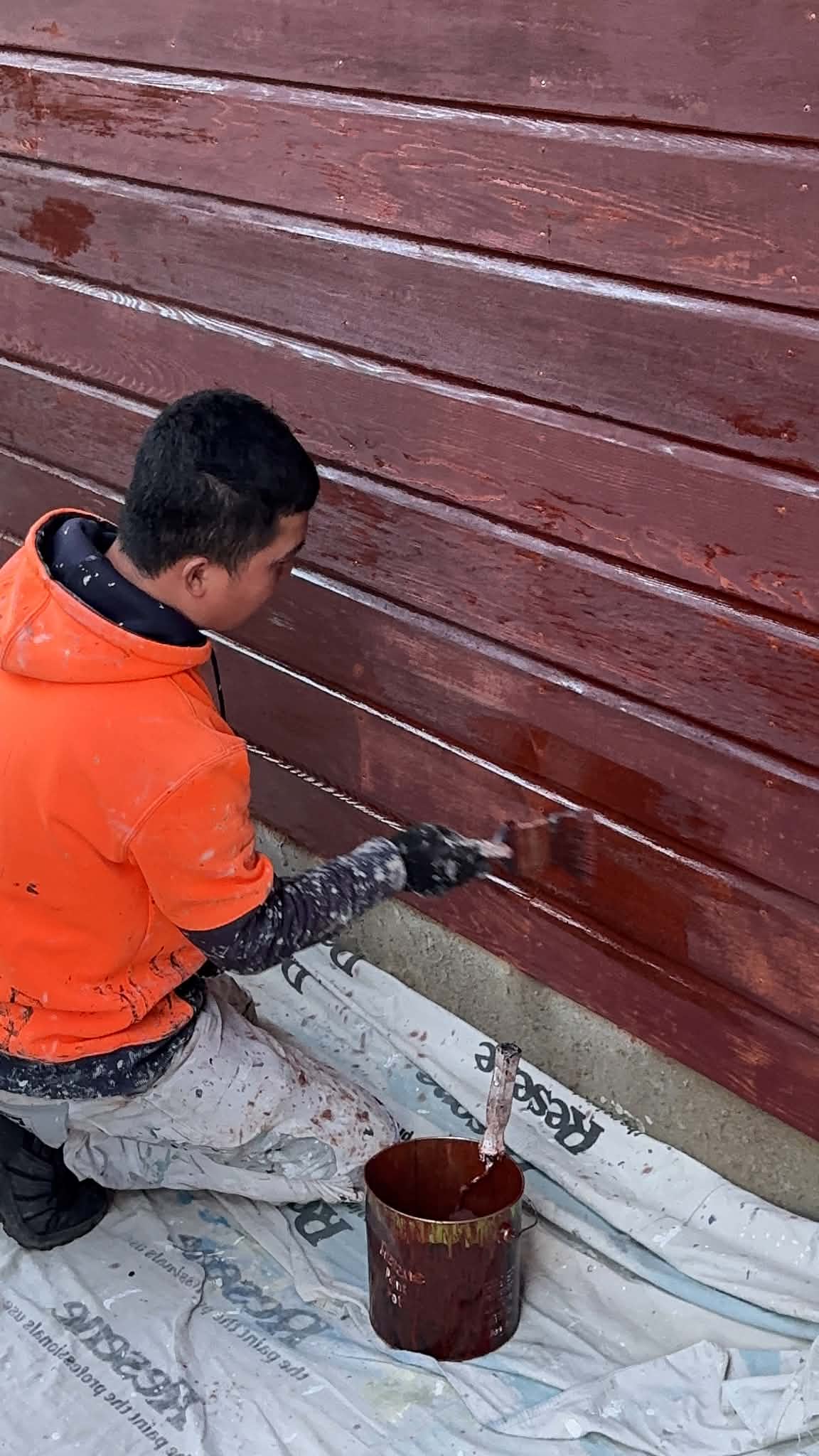 Restaining work underway at the cedar house.