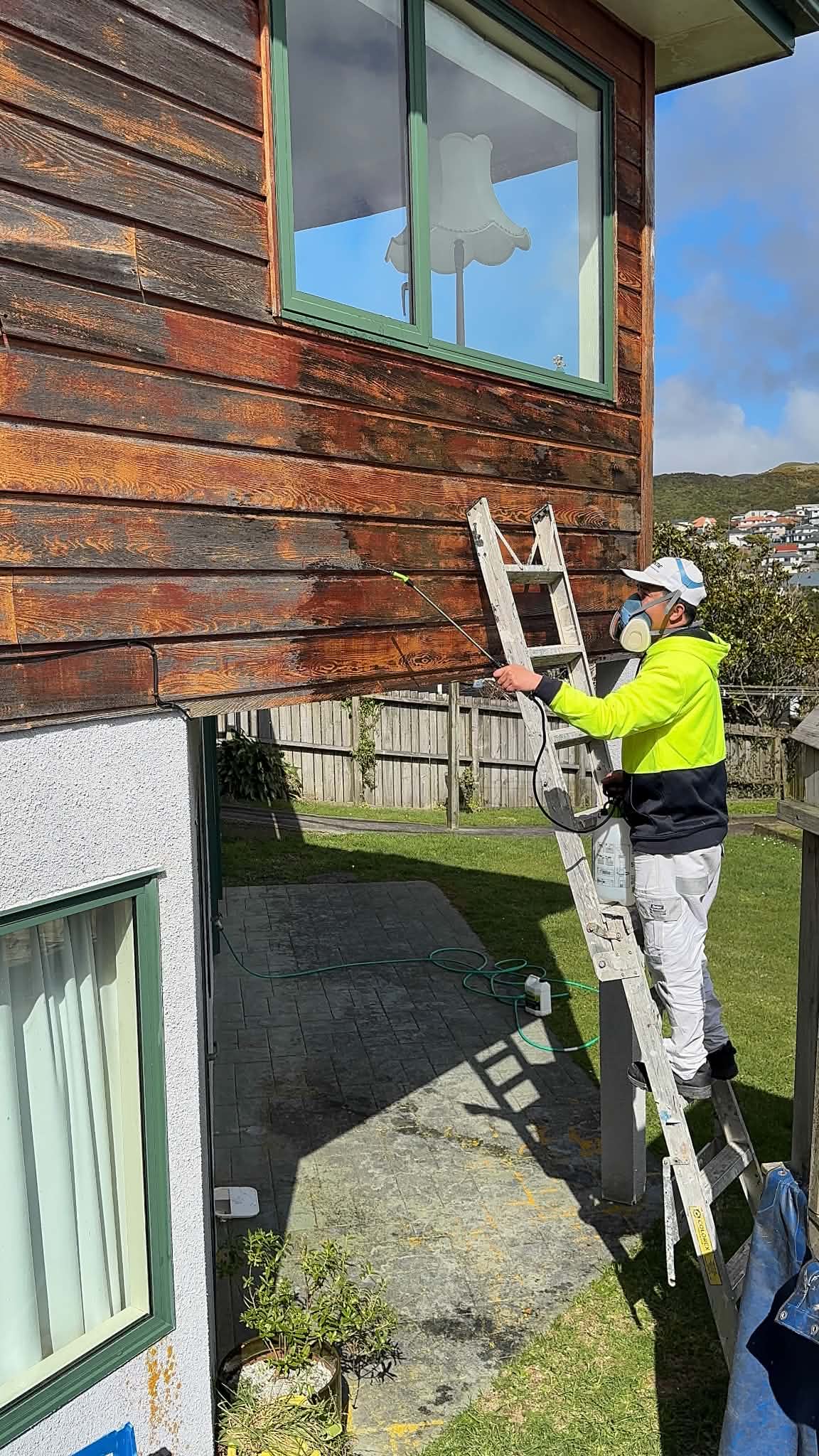 Exterior cedar work during the Johnsonville project.